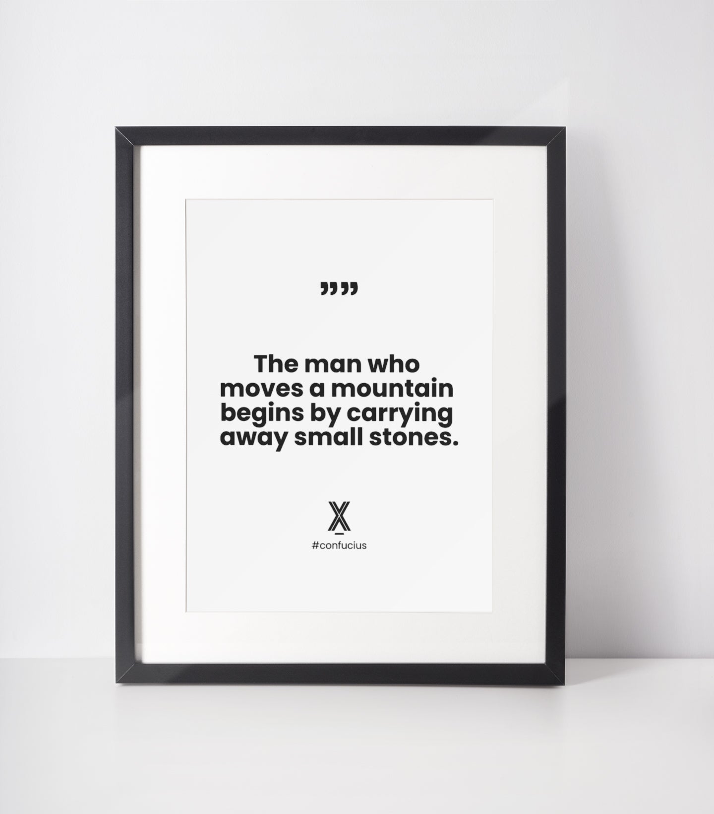 the man who moves a mountain begins by carrying away small stones mug