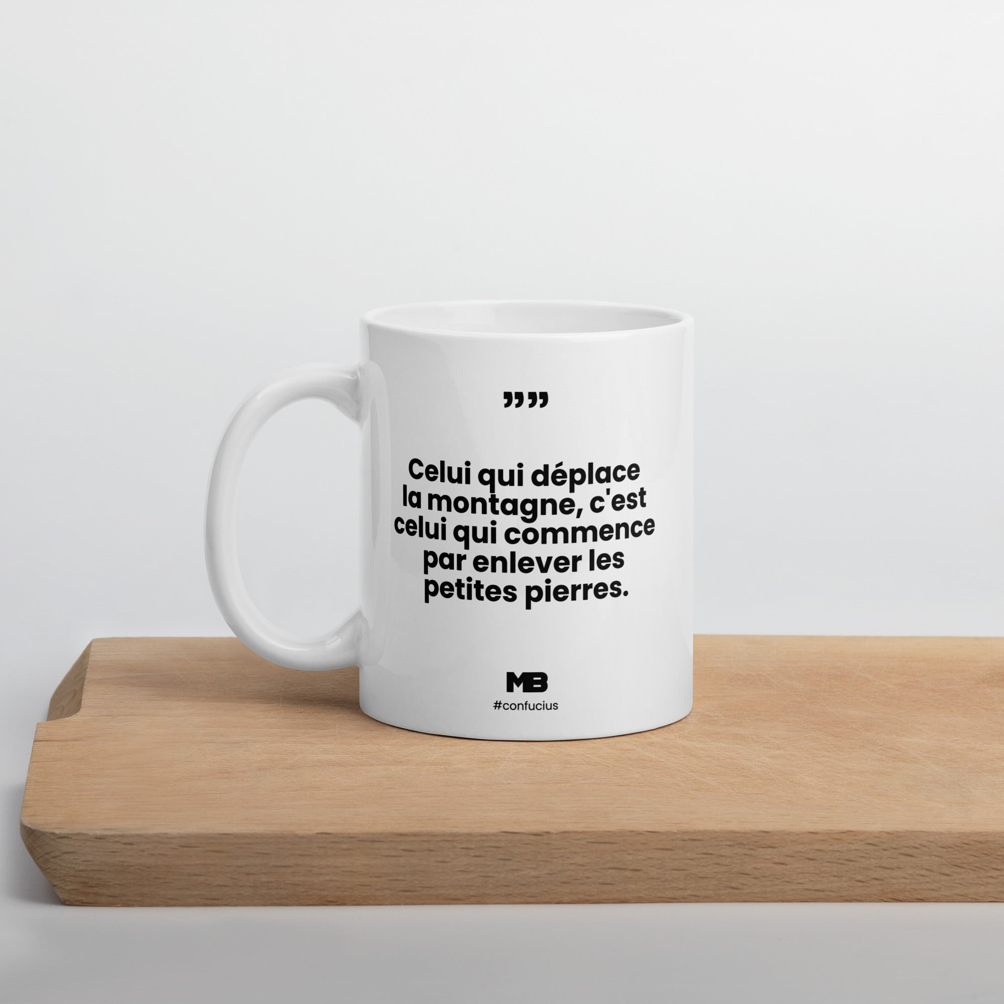 tasse celui qui deplace la montagne cest celui qui commence par enlever les petites pierres